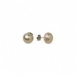 Pair of pearl stud earrings on a white background